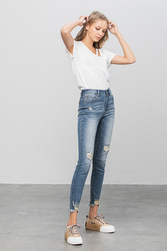 HIGH STRETCH MID RISE SKINNY JEANS